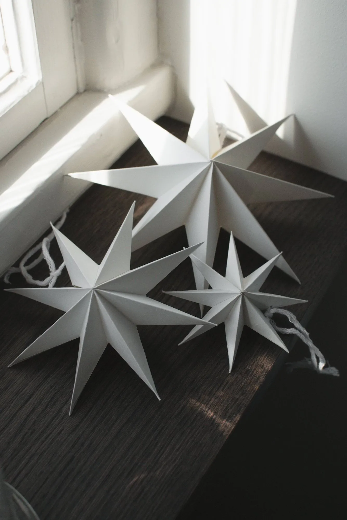 Paper winter star διακοσμητικό κρεμαστό, White, medium, Ø14 εκ. DBKD